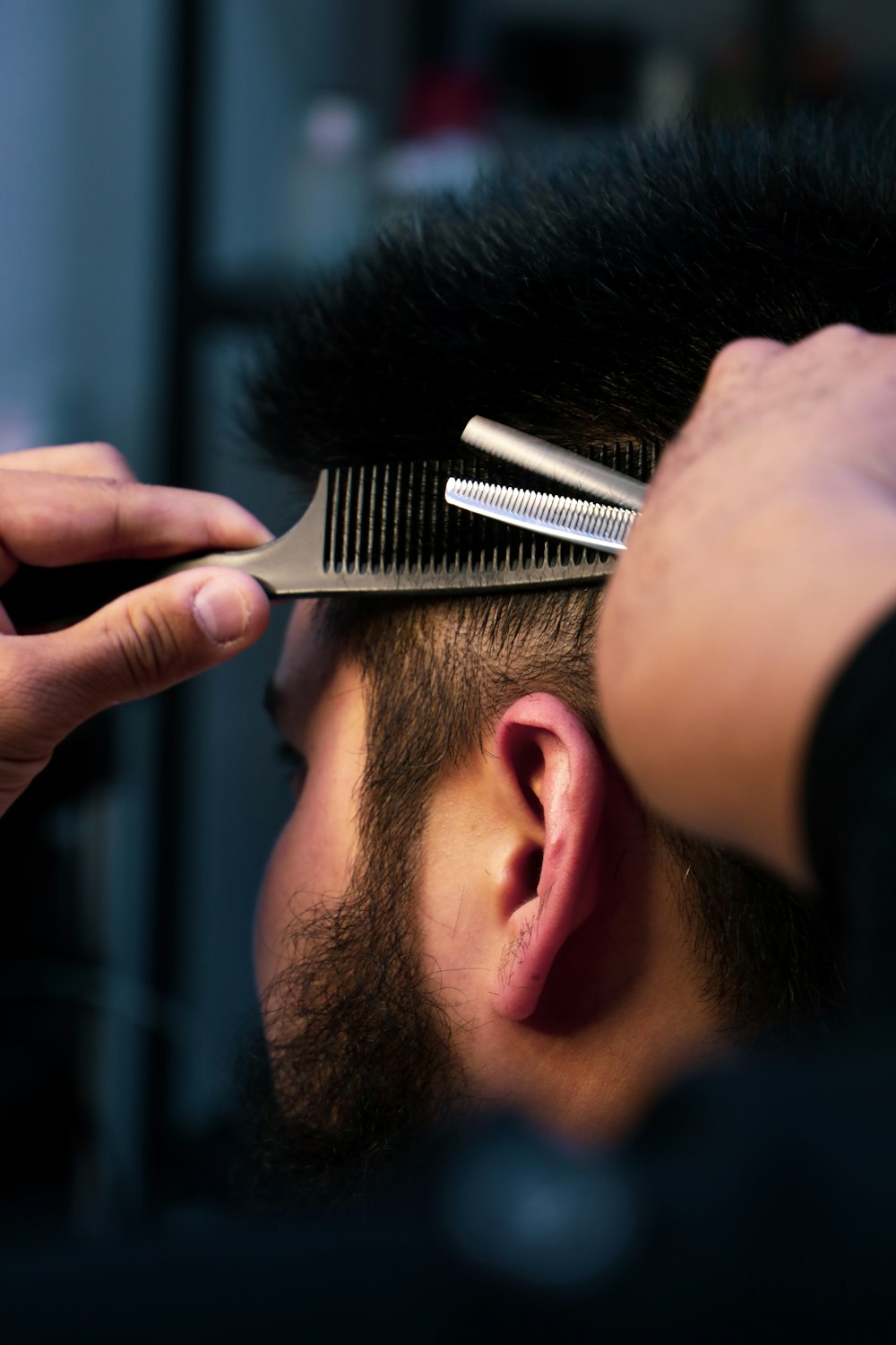 A man going through his daily grooming routine